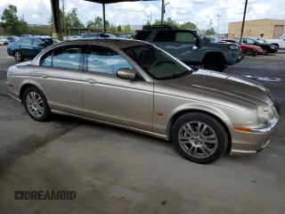 2003 Jaguar S-Type z VIN SAJEA01U53HM58399, wystawiony jako Copart lot #62006044 z przebiegiem 86 841 mil mil oraz Szkoda całkowita • Salvage title. Historia ofert i sprzedaży dostępna na DreamBid. Obrazek 4.