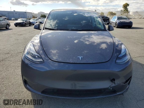 2023 Tesla Model Y Long Range with VIN 7SAYGDEE9PF638742, listed as a Copart auction lot 48188455 with 30,550 mi miles and Salvage Title. Bid and sale history available at DreamBid. Image 5.