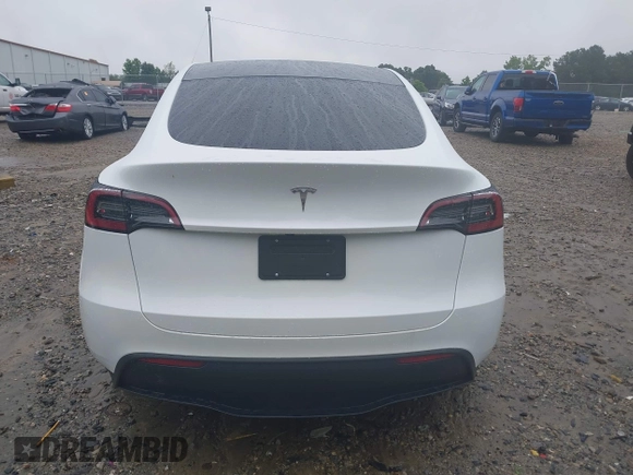 2024 Tesla Model Y with VIN 7SAYGDED9RA331840, listed as a IAAI auction lot 42350926 with 13,818 mi miles and . Bid and sale history available at DreamBid. Image 16.