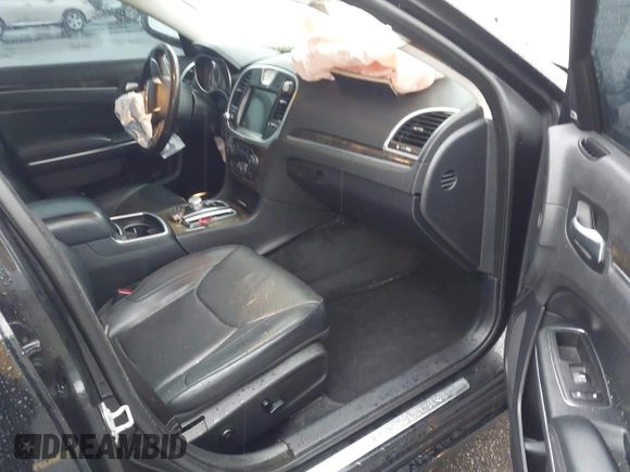 2015 Chrysler 300 C with VIN 2C3CCAEG8FH786879, listed as a IAAI auction lot 41563321 with 130,060 mi miles and . Bid and sale history available at carsss.com. Image 5.