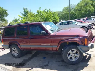 2001 Jeep Cherokee Sport with VIN 1J4FF48S51L516712, listed as a IAAI auction lot 42247399 with 323,576 mi miles and . Bid and sale history available at DreamBid. Image 14.