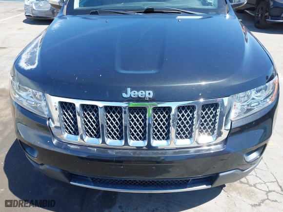 2012 Jeep Grand Cherokee Overland with VIN 1C4RJFCT7CC185602, listed as a IAAI auction lot 42018715 with 91,507 mi miles. Bid and sale history available at carsss.com. Image 6.