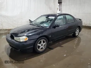 1998 Ford Contour z VIN 1FAFP68GXWK272570, wystawiony jako Copart lot #73166024 z przebiegiem 315 249 mil mil oraz Szkody całkowita. Historia ofert i sprzedaży dostępna na DreamBid. Obrazek 1.