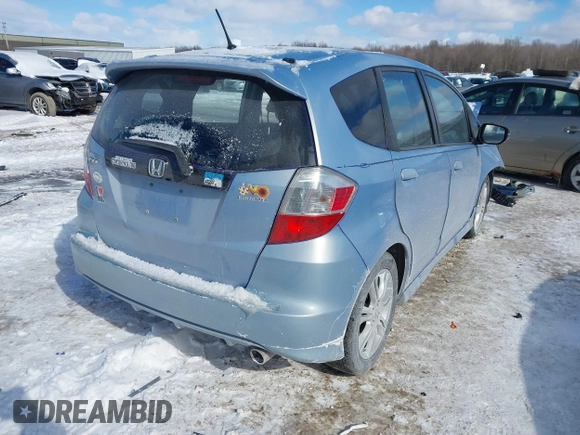 2009 Honda Fit Sport with VIN JHMGE884X9S026613, listed as a IAAI auction lot 41593112 with 144,736 mi miles. Bid and sale history available at carsss.com. Image 4.