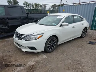 2018 Nissan Altima SR with VIN 1N4AL3AP7JC174856, listed as a IAAI auction lot 42070366 with 135,680 mi miles and . Bid and sale history available at carsss.com. Image 21.