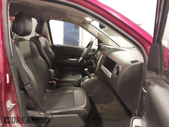 2016 Jeep Compass High Altitude Edition with VIN 1C4NJDEB8GD778764, listed as a IAAI auction lot 41704039 with 110,287 mi miles. Bid and sale history available at carsss.com. Image 5.