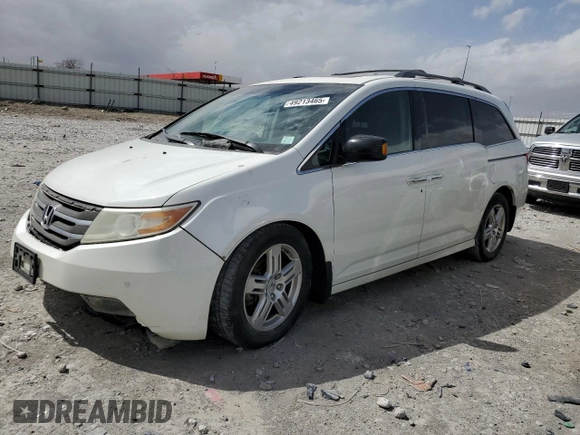 2012 Honda Odyssey Touring z VIN 5FNRL5H93CB070824, wystawiony jako Copart lot #49213465 z przebiegiem 287 745 mil mil oraz Szkoda całkowita • Salvage title. Historia ofert i sprzedaży dostępna na DreamBid. Obrazek 1.