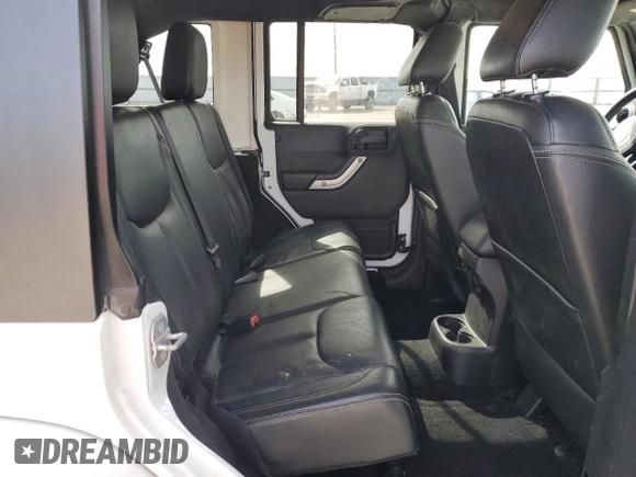 2015 Jeep Wrangler Unlimited Sahara with VIN 1C4BJWEG7FL768712, listed as a Copart auction lot 49963335 with 100,053 mi miles and Salvage Title. Bid and sale history available at carsss.com. Image 11.