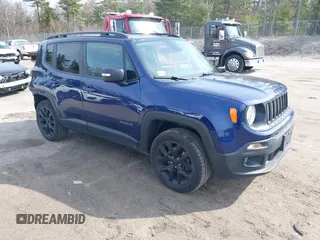 2017 Jeep Renegade Latitude z VIN ZACCJBBB7HPF43923, wystawiony jako IAAI lot #42059599 z przebiegiem 125 740 mil mil oraz . Historia ofert i sprzedaży dostępna na DreamBid. Obrazek 1.