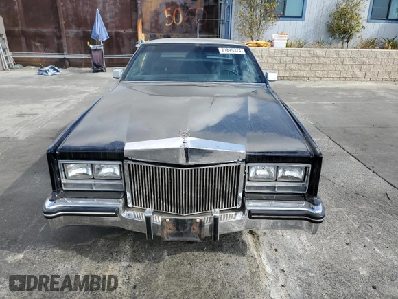 1985 Cadillac Eldorado z VIN 1G6EL578XFE640091, wystawiony jako Copart lot #71849374 z przebiegiem 30 631 mil mil oraz Szkody całkowita. Historia ofert i sprzedaży dostępna na DreamBid. Obrazek 5.