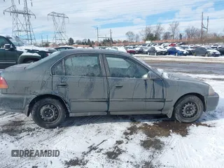 1998 Honda Civic EX with VIN 2HGEJ8647WH603464, listed as a IAAI auction lot 41376762 with 174,990 mi miles. Bid and sale history available at carsss.com. Image 13.