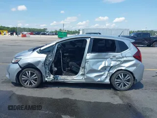 2015 Honda Fit EX-L z VIN 3HGGK5H82FM727678, wystawiony jako IAAI lot #42451860 z przebiegiem 102 512 mil mil oraz . Historia ofert i sprzedaży dostępna na DreamBid. Obrazek 14.