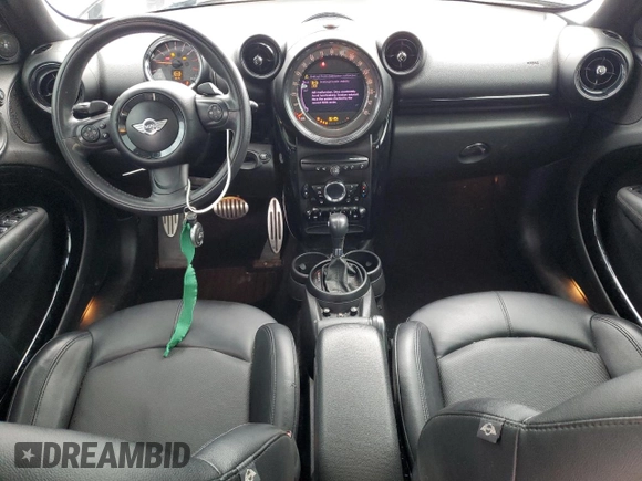 2015 MINI Countryman S with VIN WMWZC5C58FWP46931, listed as a Copart auction lot 59183495 with 105,731 mi miles and Salvage title. Bid and sale history available at DreamBid. Image 8.