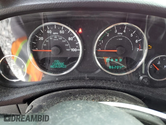 2015 Jeep Wrangler Unlimited Willys Wheeler with VIN 1C4BJWDG2FL542045, listed as a Copart auction lot 52903465 with 86,205 mi miles and Clean Title. Bid and sale history available at DreamBid. Image 9.