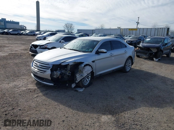 2014 Ford Taurus Limited with VIN 1FAHP2F86EG134779, listed as a IAAI auction lot 41660527 with 115,016 mi miles. Bid and sale history available at carsss.com. Image 18.
