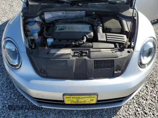 2012 Volkswagen Beetle 2.0T Turbo w/Sun/Snd/Nav PZEV with VIN 3VWVA7AT6CM662796, listed as a Copart auction lot 51649775 with 61,785 mi miles and Clean Title. Bid and sale history available at carsss.com. Image 11.