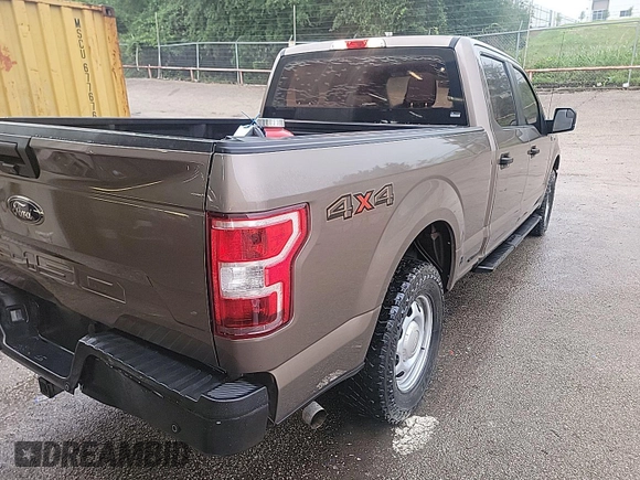 2018 Ford F-150 XL with VIN 1FTFW1E52JKE87422, listed as a IAAI auction lot 42220067 with 155,401 mi miles. Bid and sale history available at carsss.com. Image 1.
