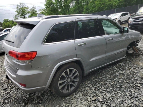2018 Jeep Grand Cherokee Overland z VIN 1C4RJFCTXJC108624, wystawiony jako Copart lot #53738094 z przebiegiem 83 040 mil mil oraz . Historia ofert i sprzedaży dostępna na DreamBid. Obrazek 3.