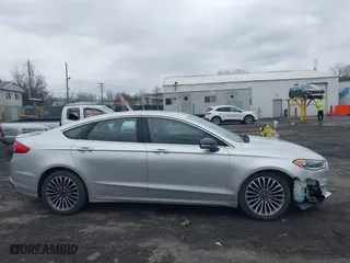 2018 Ford Fusion Titanium with VIN 3FA6P0D99JR139114, listed as a IAAI auction lot 41991248 with 142,324 mi miles. Bid and sale history available at carsss.com. Image 13.