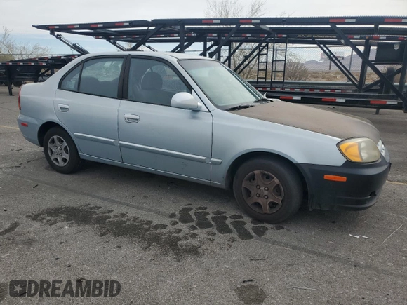 2004 Hyundai Accent GL with VIN KMHCG45C34U567915, listed as a Copart auction lot 43654985 with 141,461 mi miles and Clean Title. Bid and sale history available at carsss.com. Image 4.