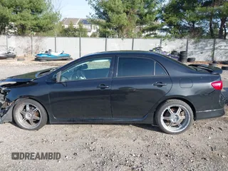 2009 Toyota Corolla with VIN 2T1BU40E29C084079, listed as a IAAI auction lot 41932383 with 172,784 mi miles. Bid and sale history available at carsss.com. Image 14.