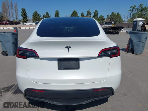 2021 Tesla Model Y Long Range with VIN 5YJYGDEEXMF280480, listed as a IAAI auction lot 41993633 with 69,579 mi miles. Bid and sale history available at carsss.com. Image 17.