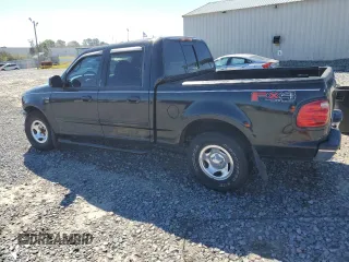 2001 Ford F-150 XLT with VIN 1FTRW07W11KE08545, listed as a Copart auction lot 49869415 with 264,349 mi miles and Salvage title. Bid and sale history available at DreamBid. Image 2.
