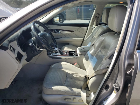 2011 Infiniti M37 with VIN JN1BY1AP9BM322203, listed as a Copart auction lot 73536594 with 253,376 mi miles and Salvage Title. Bid and sale history available at carsss.com. Image 7.