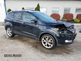 2013 Ford Escape Titanium z VIN 1FMCU0J96DUD76873, wystawiony jako Copart lot #52934235 z przebiegiem 141 834 mil mil oraz Szkody całkowita. Historia ofert i sprzedaży dostępna na DreamBid. Obrazek 4.