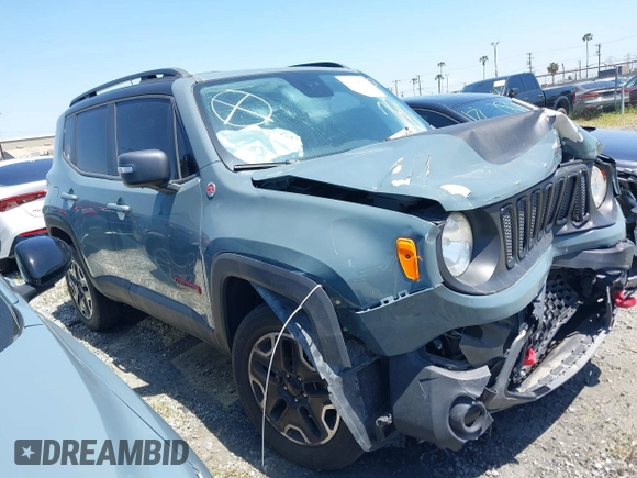 2017 Jeep Renegade Deserthawk with VIN ZACCJBCB1HPG12779, listed as a IAAI auction lot 41294595 with 92,316 mi miles and . Bid and sale history available at DreamBid. Image 1.