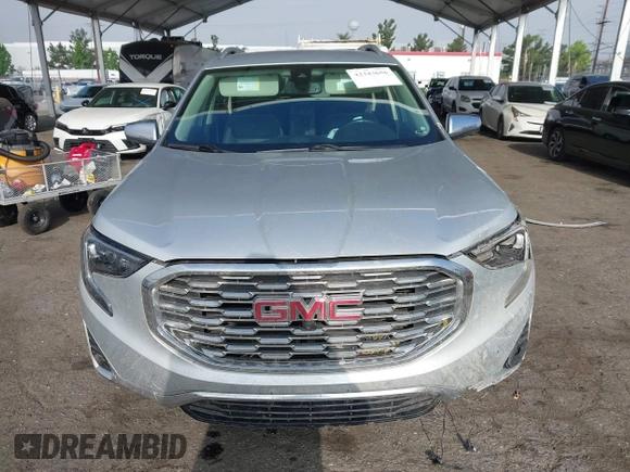 2020 GMC Terrain Denali z VIN 3GKALXEX0LL294117, wystawiony jako IAAI lot #42343656 z przebiegiem 67 697 mil mil oraz . Historia ofert i sprzedaży dostępna na DreamBid. Obrazek 13.