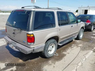 1997 Ford Explorer XL z VIN 1FMDU34E8VZC05433, wystawiony jako IAAI lot #42149185 z przebiegiem 385 208 mil mil oraz . Historia ofert i sprzedaży dostępna na DreamBid. Obrazek 4.