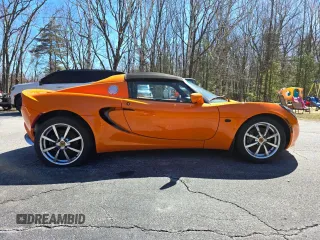 2007 Lotus Elise z VIN SCCPC11137HL30017, wystawiony jako Copart lot #52991635 z przebiegiem 3930 mil mil oraz Tytuł czysty. Historia ofert i sprzedaży dostępna na DreamBid. Obrazek 2.