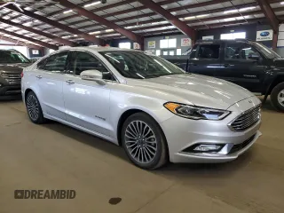 2017 Ford Fusion Hybrid Titanium z VIN 3FA6P0RU1HR300370, wystawiony jako Copart lot #65206605 z przebiegiem 150 424 mil mil oraz Czysty tytuł • Clean title. Historia ofert i sprzedaży dostępna na DreamBid. Obrazek 4.