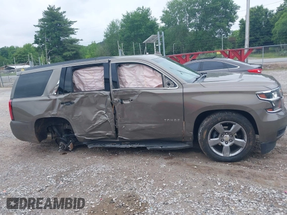 2016 Chevrolet Tahoe LT z VIN 1GNSCBKC2GR420861, wystawiony jako IAAI lot #42205983 z przebiegiem 149 680 mil mil oraz . Historia ofert i sprzedaży dostępna na DreamBid. Obrazek 14.