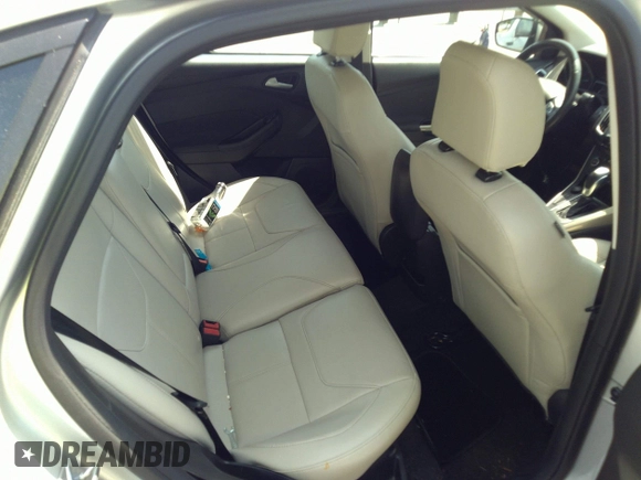 2018 Ford Focus Titanium with VIN 1FADP3J26JL280723, listed as a IAAI auction lot 42319900 with 149,583 mi miles and . Bid and sale history available at DreamBid. Image 8.