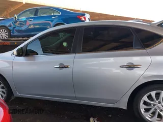 2019 Nissan Sentra S z VIN 3N1AB7AP0KY431212, wystawiony jako IAAI lot #41615063 z przebiegiem 129 322 mil mil oraz . Historia ofert i sprzedaży dostępna na DreamBid. Obrazek 15.