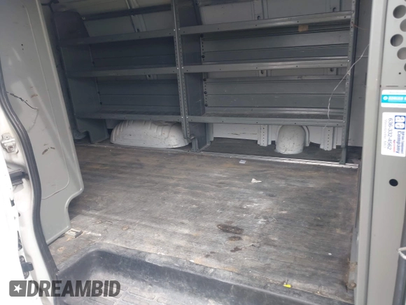 2012 Chevrolet Express Cargo Van with VIN 1GCWGFCA7C1121989, listed as a IAAI auction lot 42118853 with 214,478 mi miles. Bid and sale history available at carsss.com. Image 8.