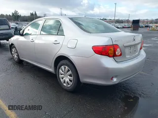 2009 Toyota Corolla with VIN 1NXBU40E39Z131392, listed as a IAAI auction lot 41194018 with 136,031 mi miles. Bid and sale history available at carsss.com. Image 3.