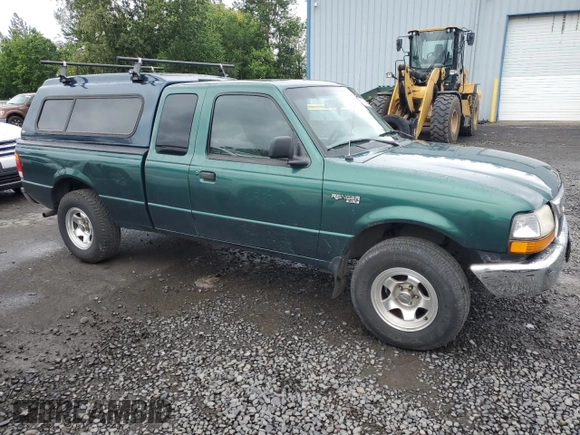 1999 Ford Ranger XL with VIN 1FTYR14V6XPA93323, listed as a Copart auction lot 59769985 with 345,075 mi miles and Salvage title. Bid and sale history available at DreamBid. Image 4.