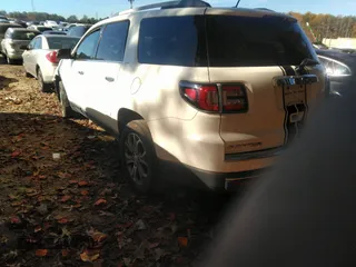 2014 GMC Acadia SLT z VIN 1GKKRRKD5EJ120191, wystawiony jako IAAI lot #40817995 z przebiegiem 207 987 mil mil oraz . Historia ofert i sprzedaży dostępna na DreamBid. Obrazek 3.