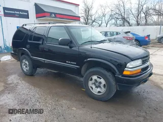 2002 Chevrolet Blazer LS z VIN 1GNDT13W92K170614, wystawiony jako IAAI lot #41745723 z przebiegiem 119 571 mil mil oraz . Historia ofert i sprzedaży dostępna na DreamBid. Obrazek 1.