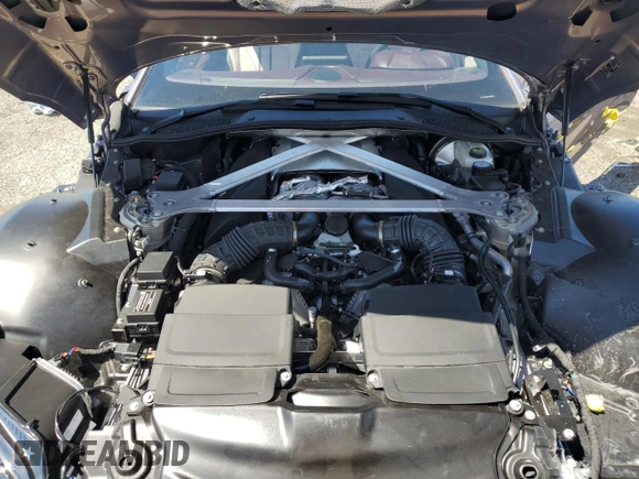 2023 Aston Martin Vantage z VIN SCFSMGBW0PGP08680, wystawiony jako Copart lot #49828114 z przebiegiem Nie podano mil oraz . Historia ofert i sprzedaży dostępna na DreamBid. Obrazek 11.