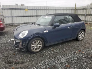 2018 MINI Convertible Cooper S with VIN WMWWG9C54J3E38487, listed as a Copart auction lot 74836504 with 0 mi miles and Salvage Title. Bid and sale history available at carsss.com. Image 1.