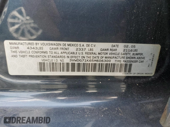 2005 Volkswagen Jetta 2.5L with VIN 3VWDG71K65M606300, listed as a Copart auction lot 57848515 with 108,928 mi miles and Salvage title. Bid and sale history available at DreamBid. Image 12.