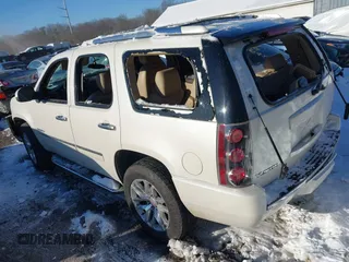 2014 GMC Yukon Denali with VIN 1GKS2EEF3ER181504, listed as a IAAI auction lot 41267224 with 165,478 mi miles. Bid and sale history available at carsss.com. Image 3.