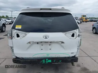 2011 Toyota Sienna SE with VIN 5TDXK3DC1BS069696, listed as a IAAI auction lot 41976857 with 160,994 mi miles. Bid and sale history available at carsss.com. Image 17.