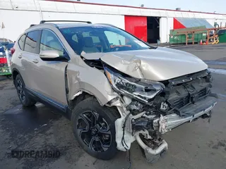2017 Honda CR-V Touring with VIN 5J6RW2H99HL002127, listed as a IAAI auction lot 41517919 with 18,367 mi miles. Bid and sale history available at carsss.com. Image 1.