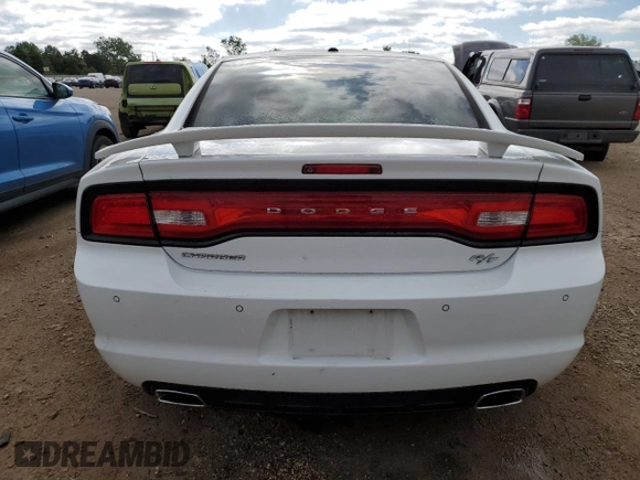 2012 Dodge Charger RT with VIN 2C3CDXCT2CH239697, listed as a Copart auction lot 54951124 with 144,692 mi miles and Salvage Title. Bid and sale history available at DreamBid. Image 6.