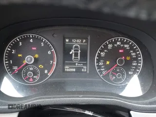 2012 Volkswagen Passat SE z VIN 1VWBP7A31CC099045, wystawiony jako IAAI lot #42063773 z przebiegiem 166 998 mil mil oraz . Historia ofert i sprzedaży dostępna na DreamBid. Obrazek 7.